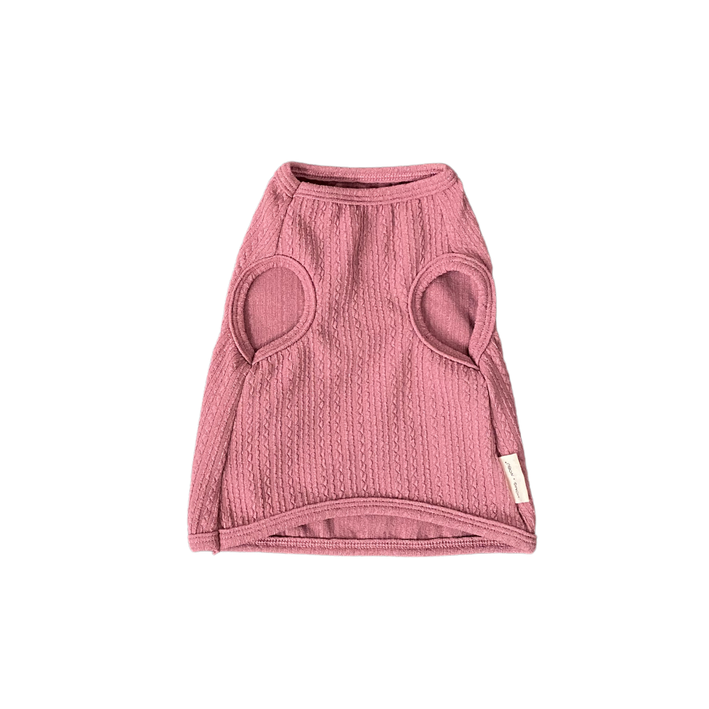 Pink dog sweater on a white background