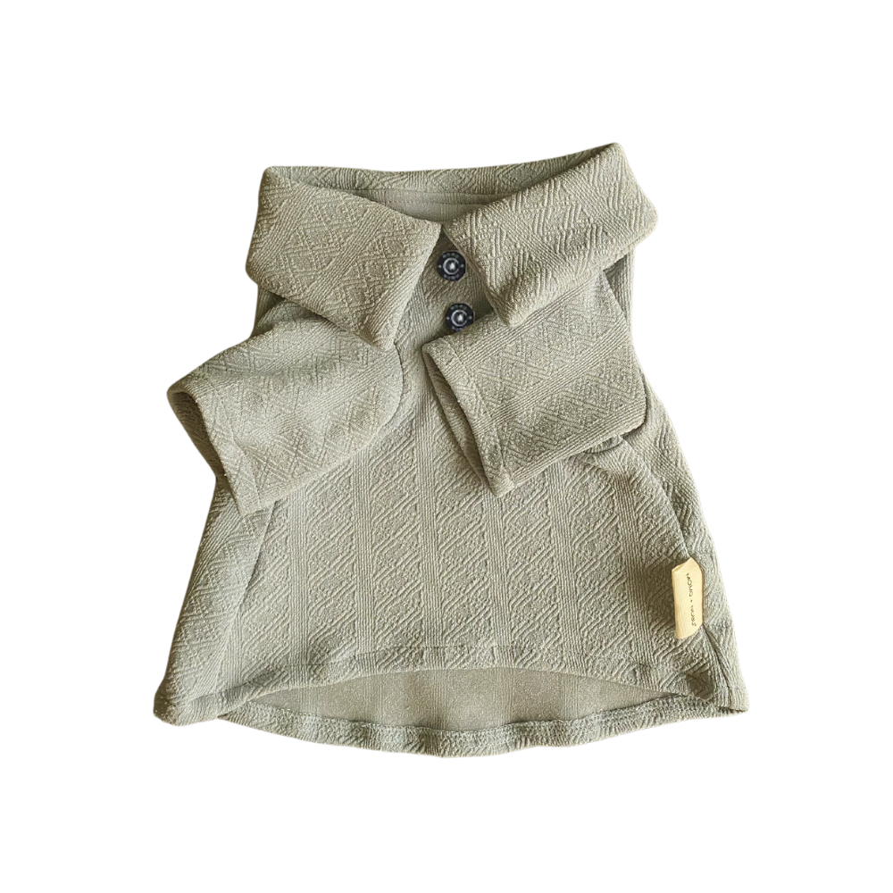 Green textured jacket with button details on a white background