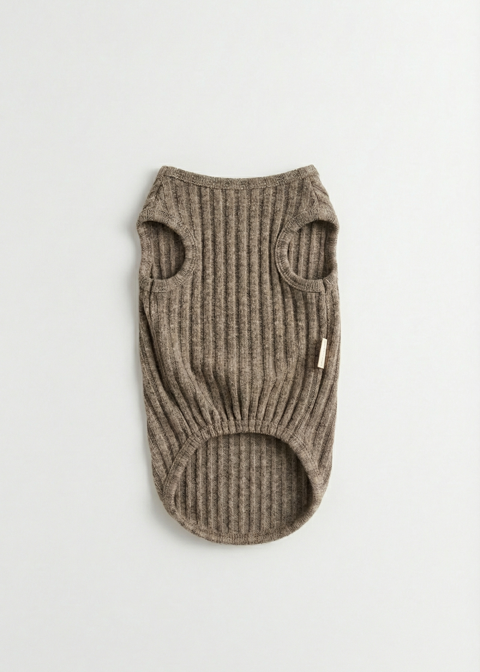 Knitted dog sweater on a light gray background