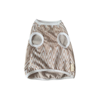 Dog sweater with zigzag pattern and circular mesh holes on a white background