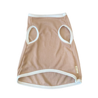 Beige pet dress with mesh design on a white background