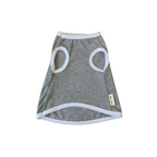 Gray pet dress with circular cutouts on a white background