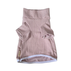 Pink textured dog sweater on a white background