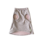 dog shirtin pink with circular cutouts on a white background