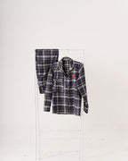 Plaid shirt and pants set on a white background
