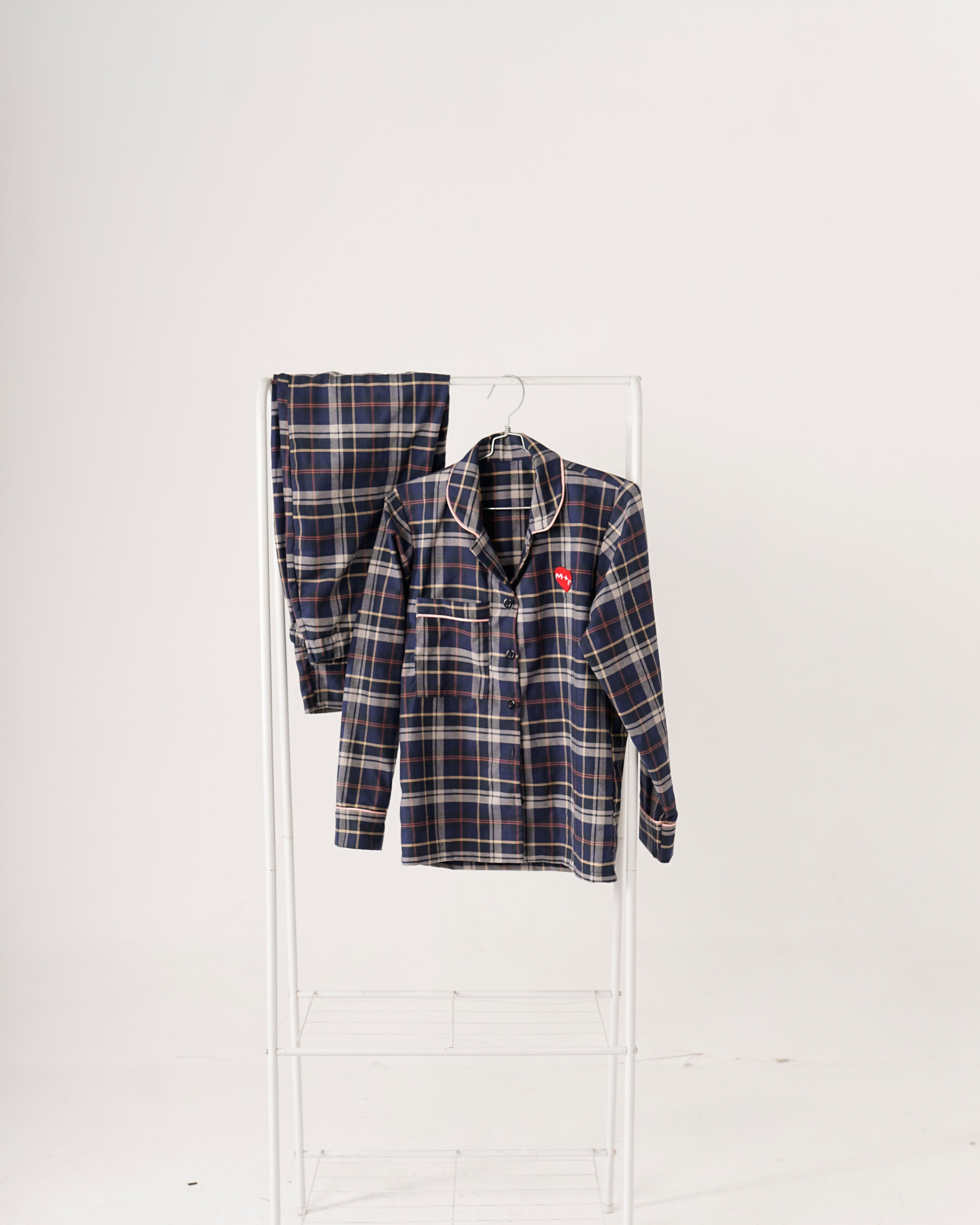 Plaid shirt and pants set on a white background