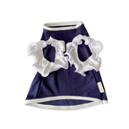 Navy blue pet dress with white ruffled details on a white background