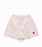 Red and white striped shorts on a white background