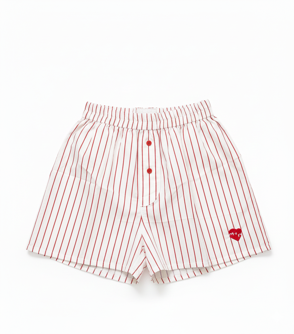 Red and white striped shorts on a white background