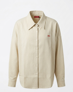 Beige striped shirt with a small logo on a white background