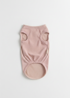 Pink baby romper on a light gray background